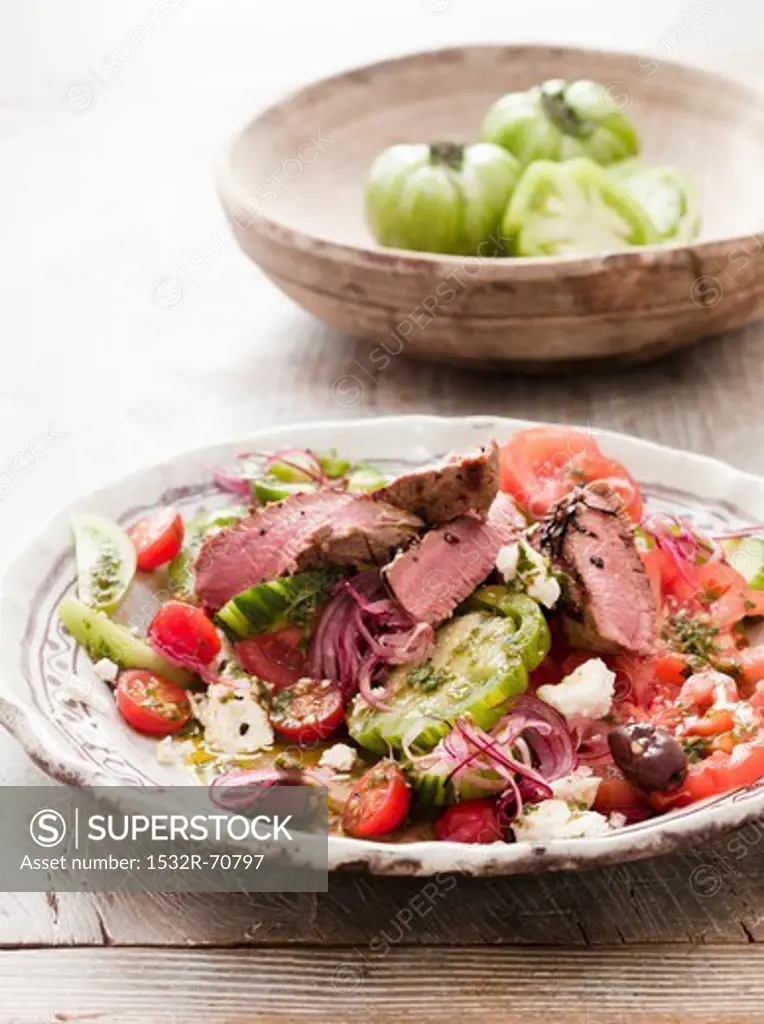 Lamb salad with tomatoes, feta and olives (Greece)