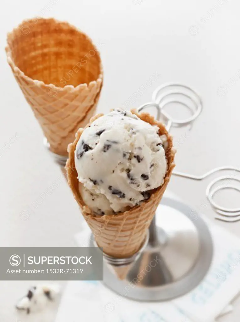 An ice cream cone filled with almond and stracciatella ice cream
