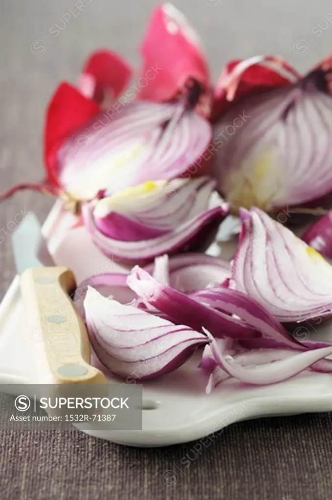Red onions, halved and in wedges