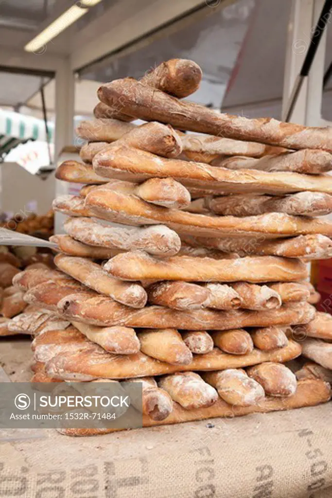 Stacked baguettes at the market