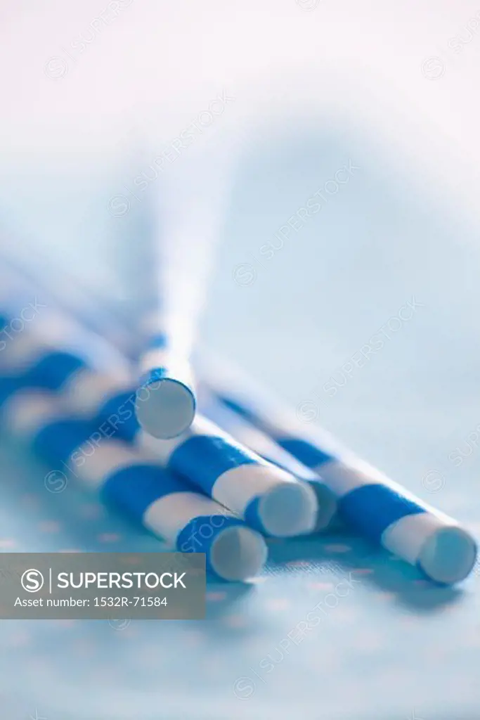 Blue and white striped drinking straws