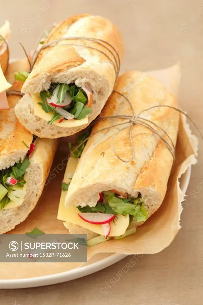 Sandwiches with ham, cheese and vegetables