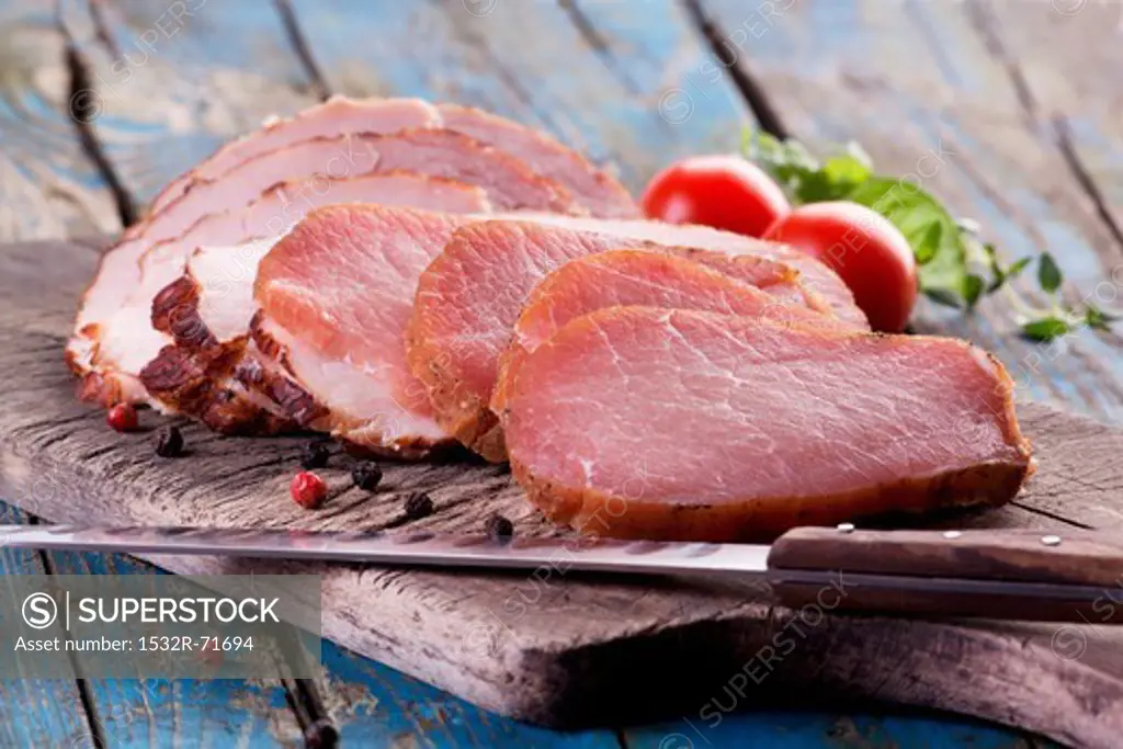 Smoked ham on a wooden board