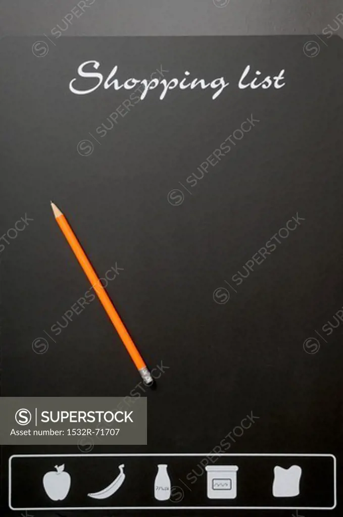 A board for writing a shopping list, with a pencil