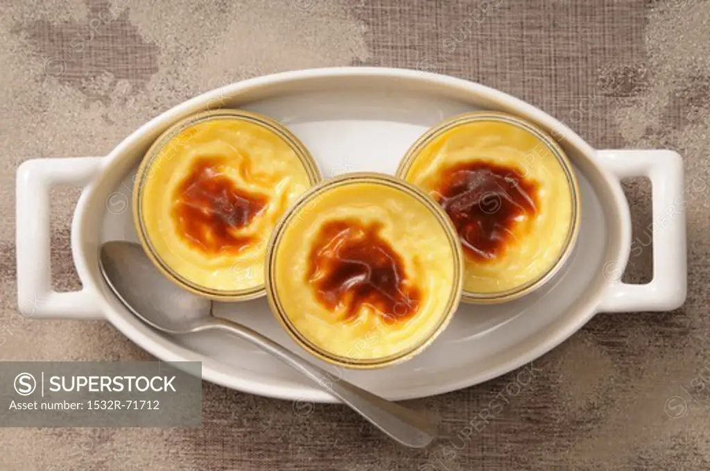 Crème caramel in three glass dishes