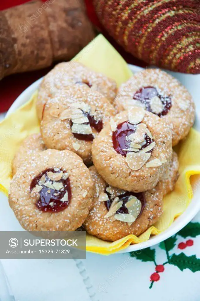 Husarenkrapfen (shortbread jam biscuits) with sliced almonds