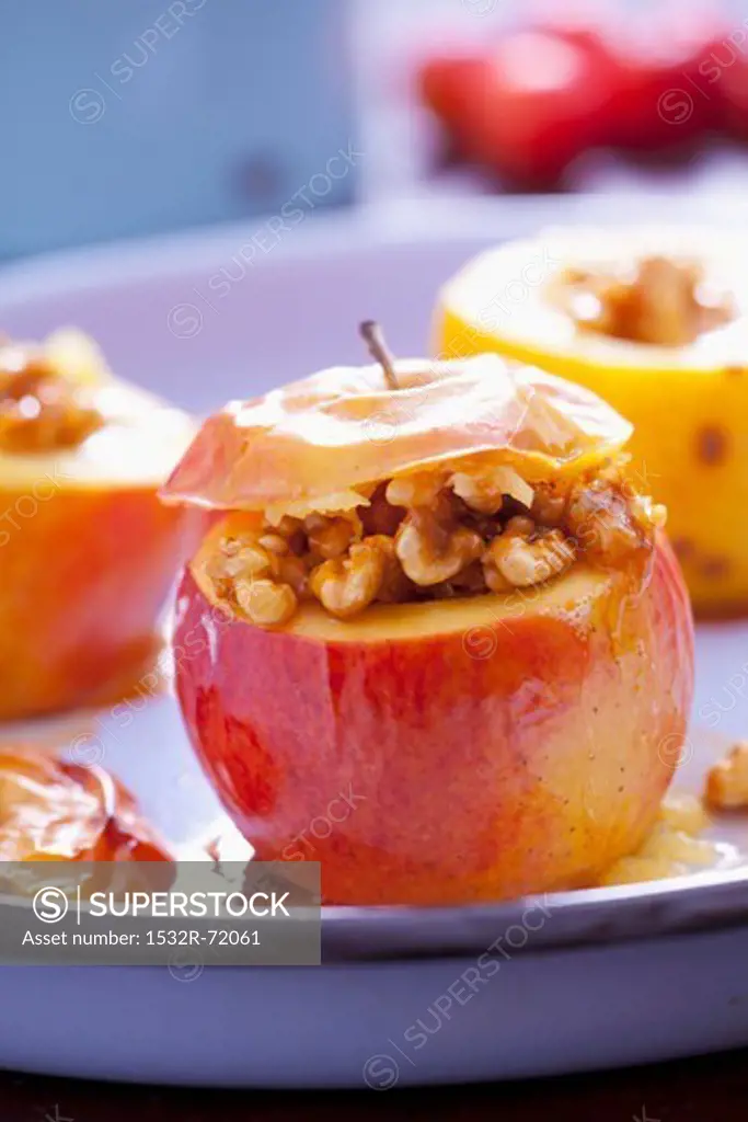 Baked apples stuffed with nuts and honey