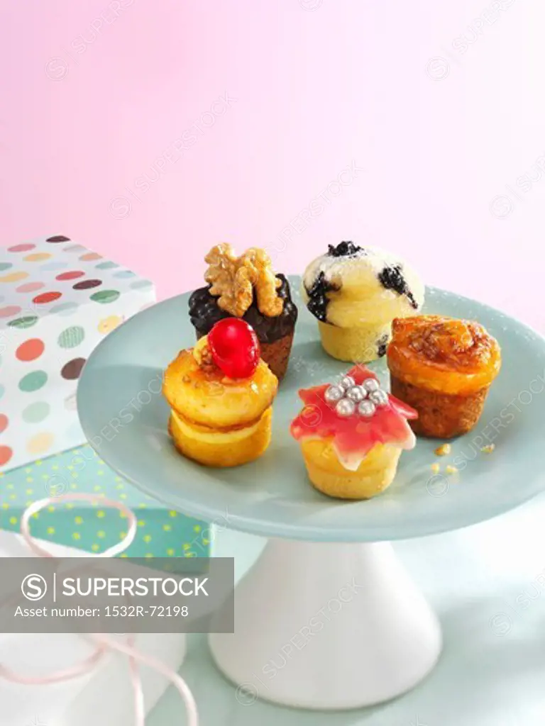 Assorted cupcakes on a cake stand