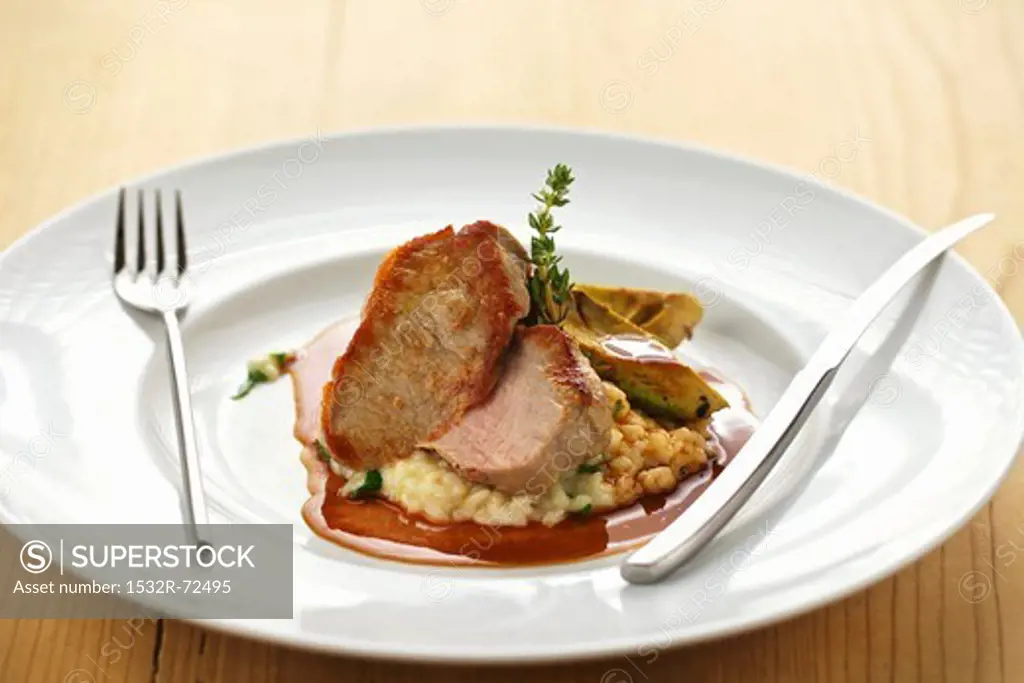 Veal tenderloin with avocado wedges and lemon risotto