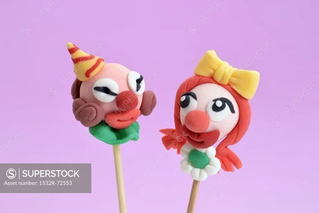 Cake pops decorated to look like clowns