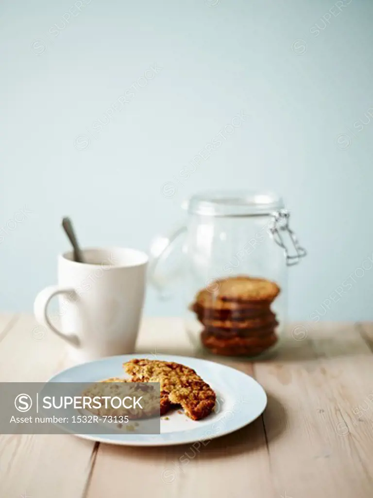 Anzac biscuits (Australia) in a jar and on a plate, 8/2/2013