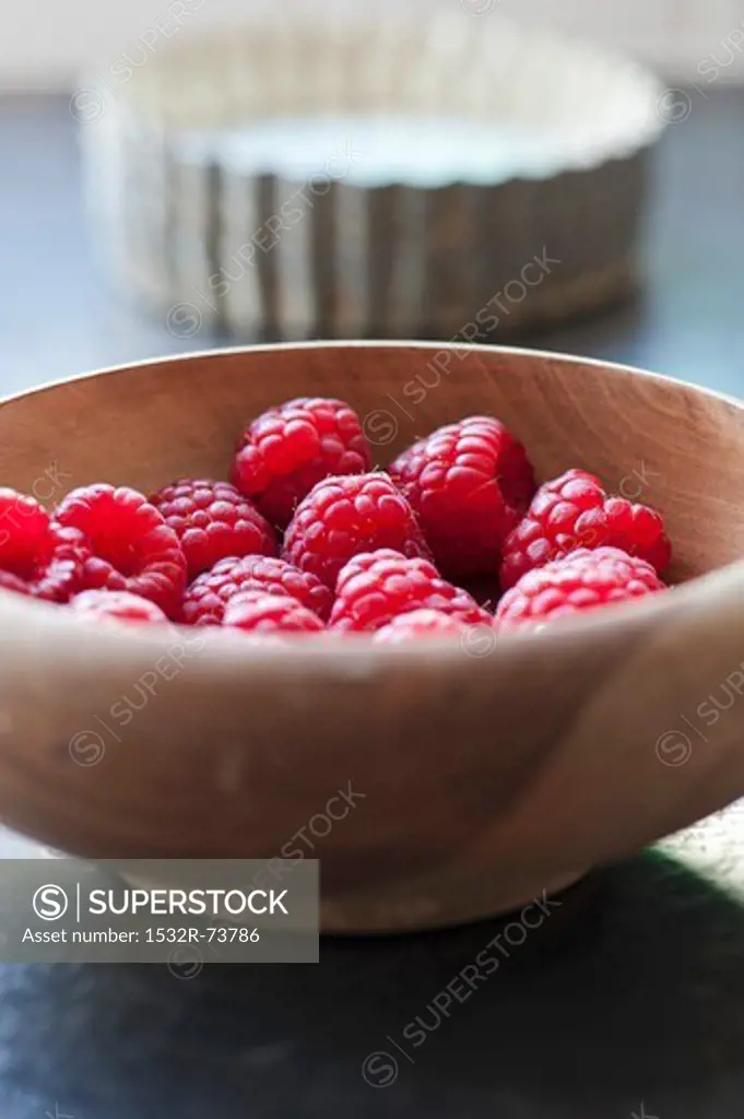 raspberries in a bowl with tart baking tins, 8/27/2013