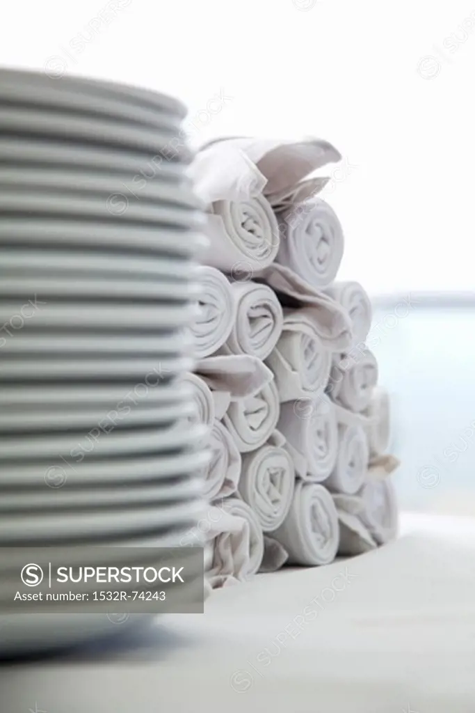 White plates and napkins, stacked, 9/4/2013