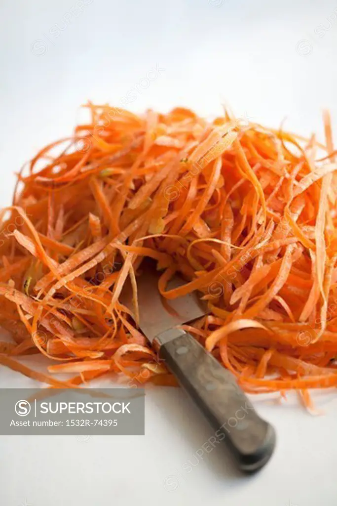 A mound of carrot peelings with a knife, 9/9/2013