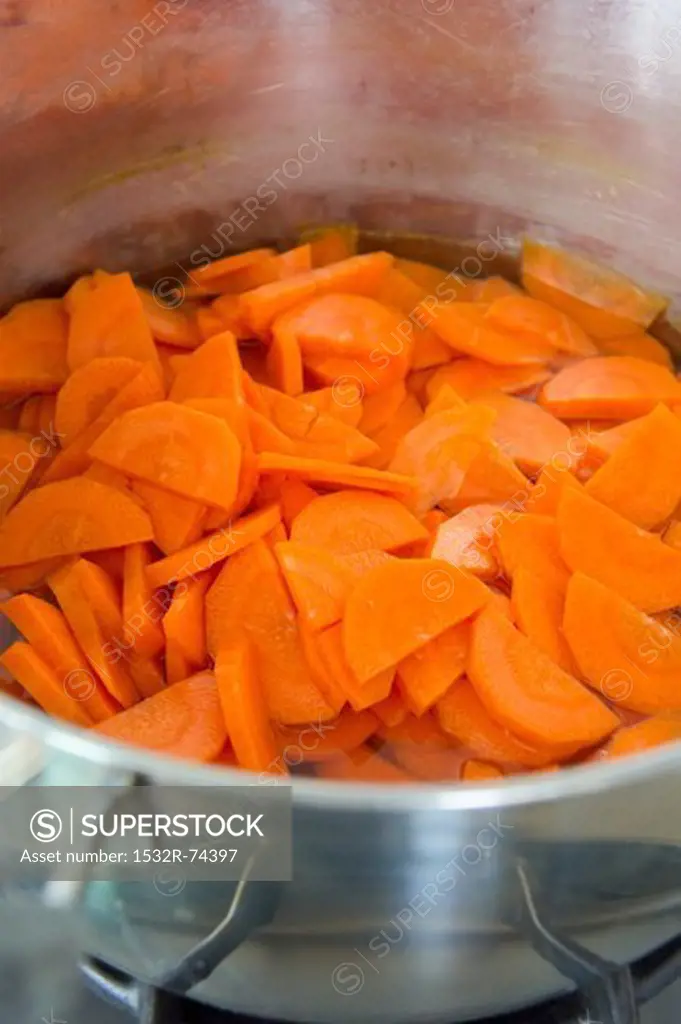 Sliced carrots being boiled in water, 9/9/2013