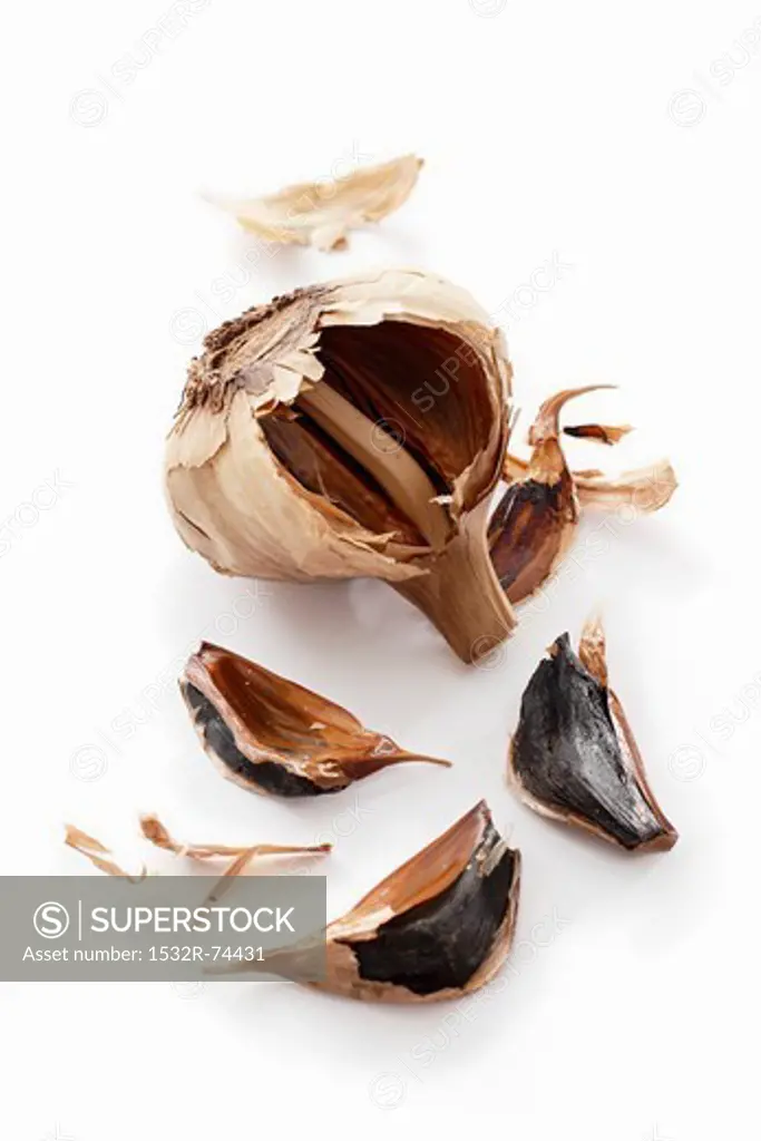 Fermented garlic against a white background, 9/10/2013