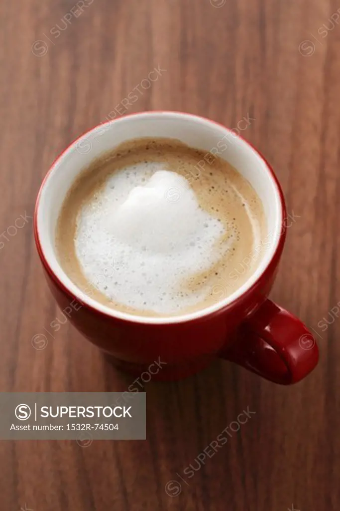 A cup of coffee with frothed milk, 9/10/2013