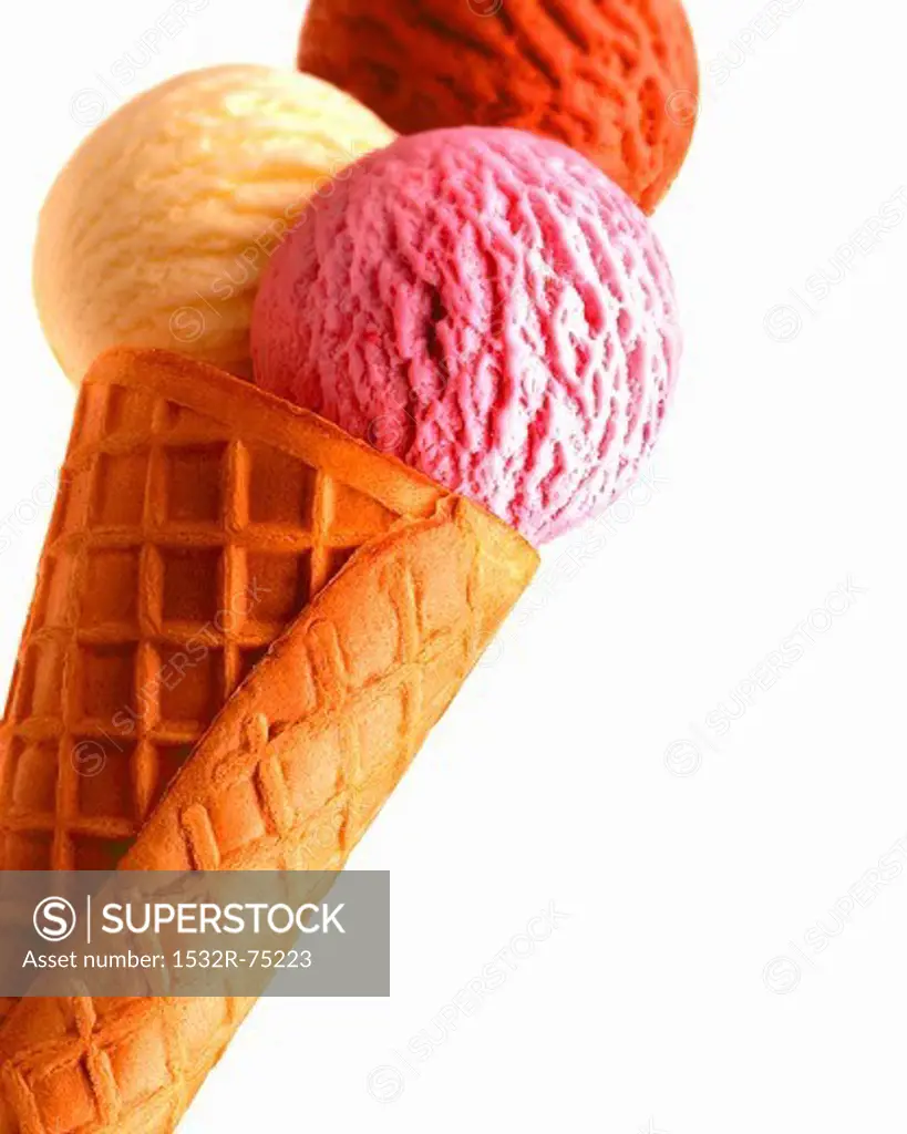 An ice cream cone with three scoops of ice cream (strawberry, vanilla, chocolate), 10/1/2013