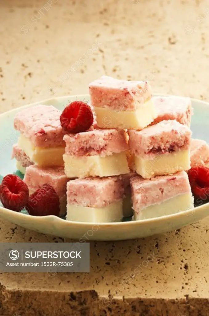 Cubes of coconut and raspberry ice cream with fresh raspberries, 10/1/2013
