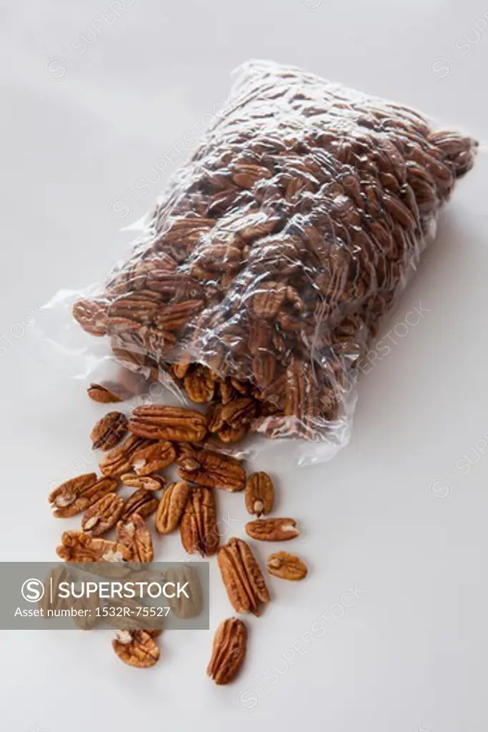 Pecan nuts spilling out of a plastic bag, 10/15/2013