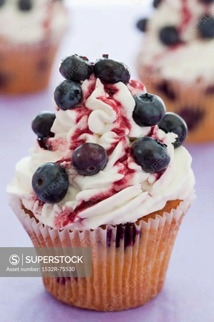 Blueberry cupcakes with mascarpone icing and cherry sauce, 10/16/2013