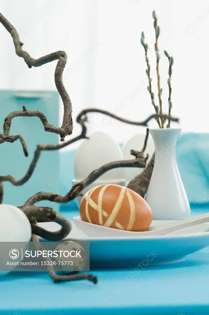 An Easter table decoration with eggs and corkscrew willow, 10/22/2013