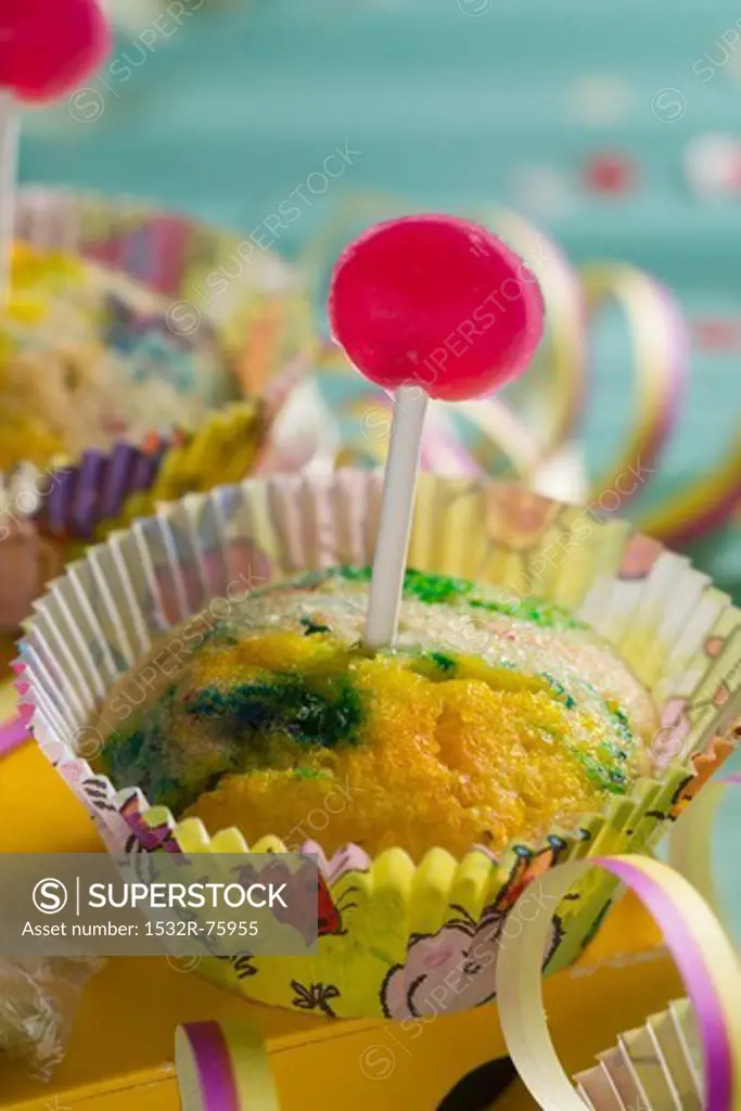 A muffin with green colouring and a lollipop (for a birthday or New Year), 10/23/2013