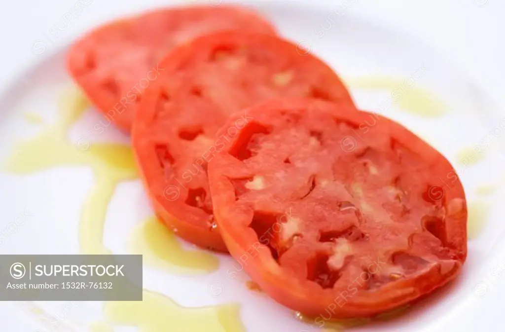 Sliced Tomatoes on a White Plate Drizzled with Olive Oil, 10/30/2013