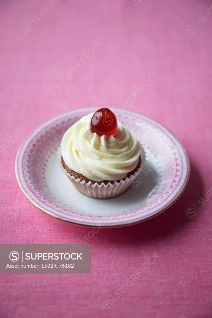 Cherry cupcake with cream icing and a glacé cherry, 10/29/2013