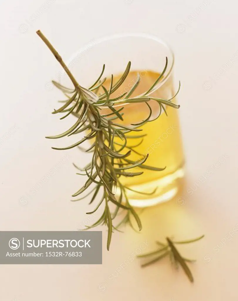 A small glass of oil with a sprig of rosemary, 11/27/2013
