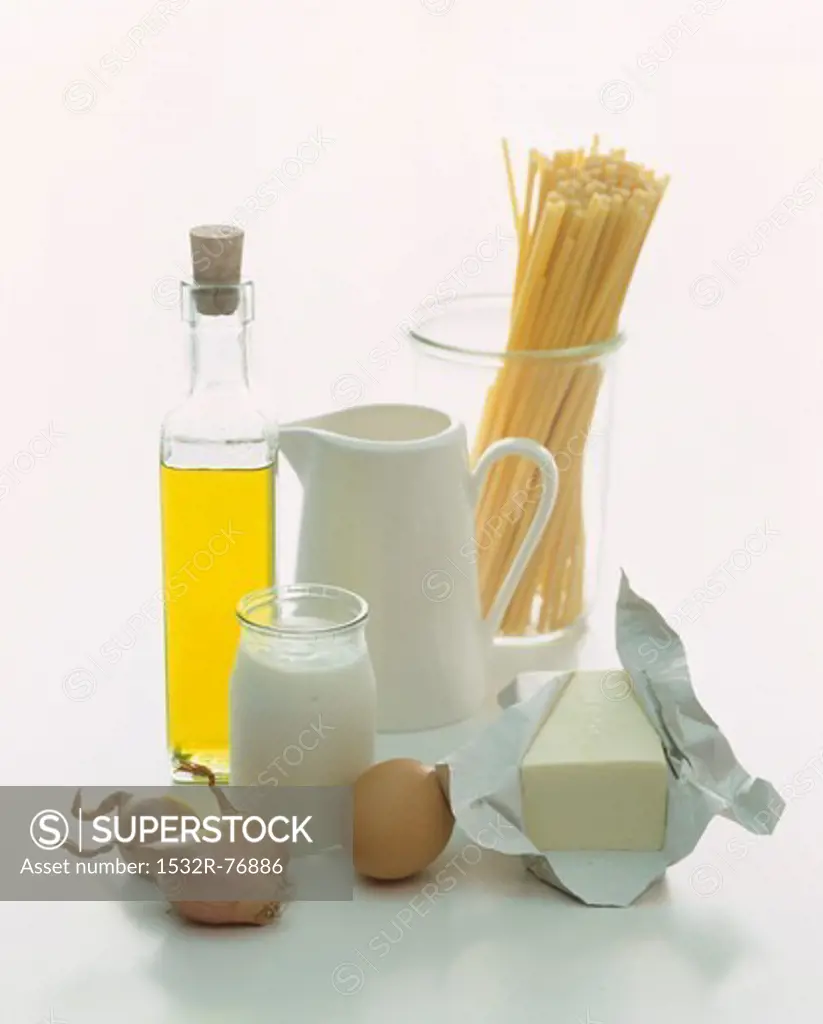 A still life of foodstuffs featuring milk, yoghurt, oil, pasta, an egg and butter, 11/27/2013
