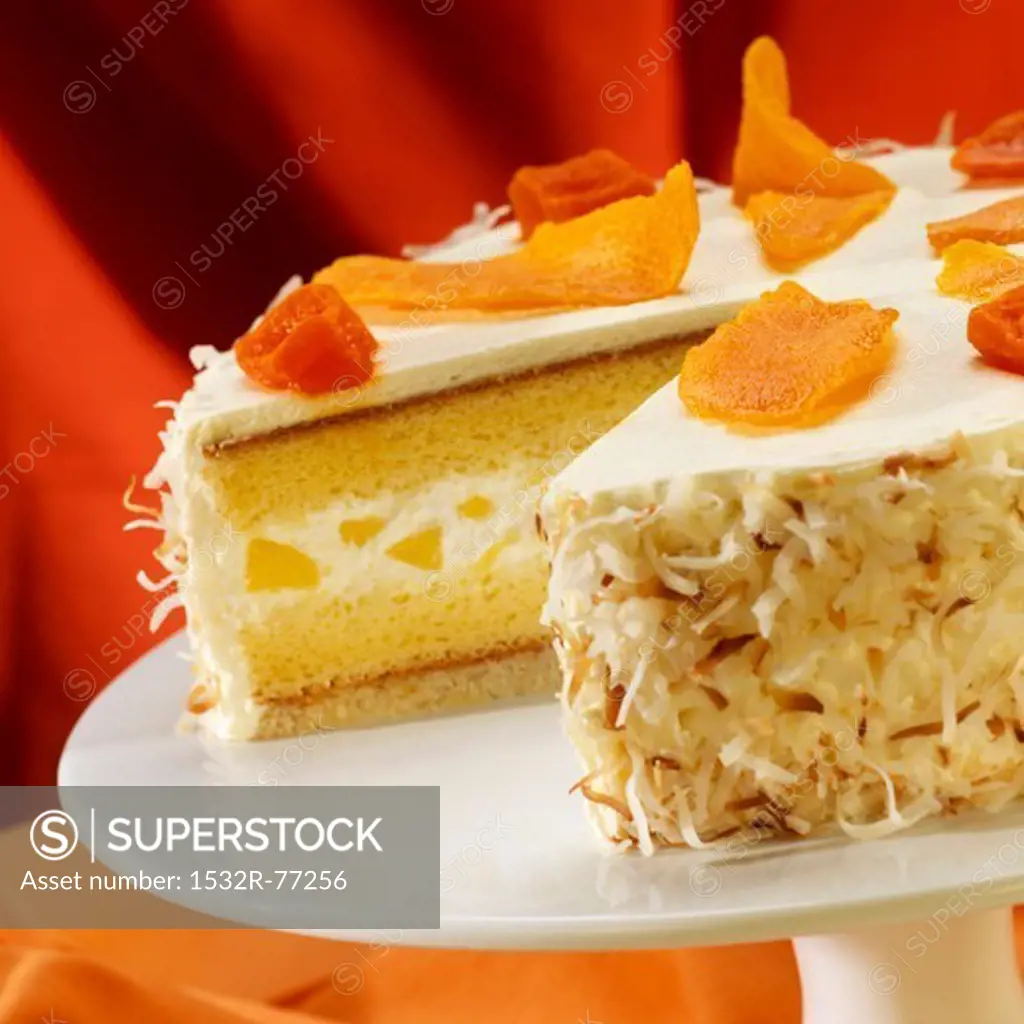 Pineapple Cream Cake Topped with Dried Mango and Papaya with Toasted Coconut; Slice Removed, 12/9/2013