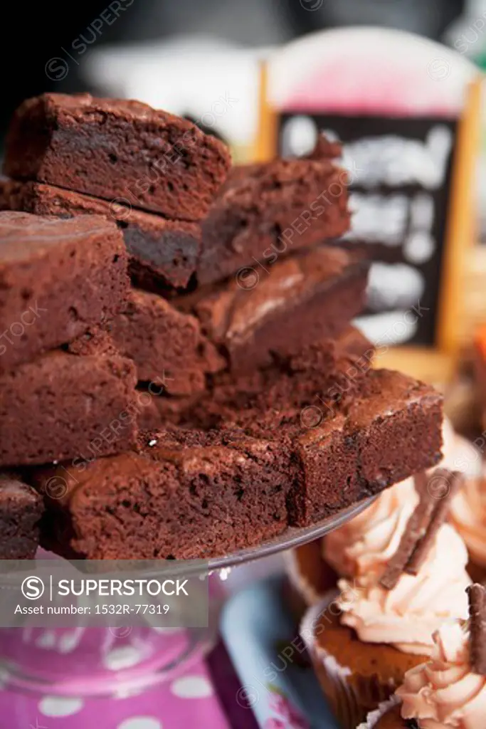 Stacked brownies on a cake stand in a bakery, 12/9/2013