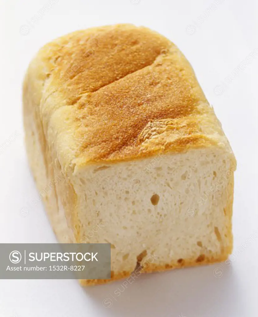 Partially Sliced Loaf of White Bread