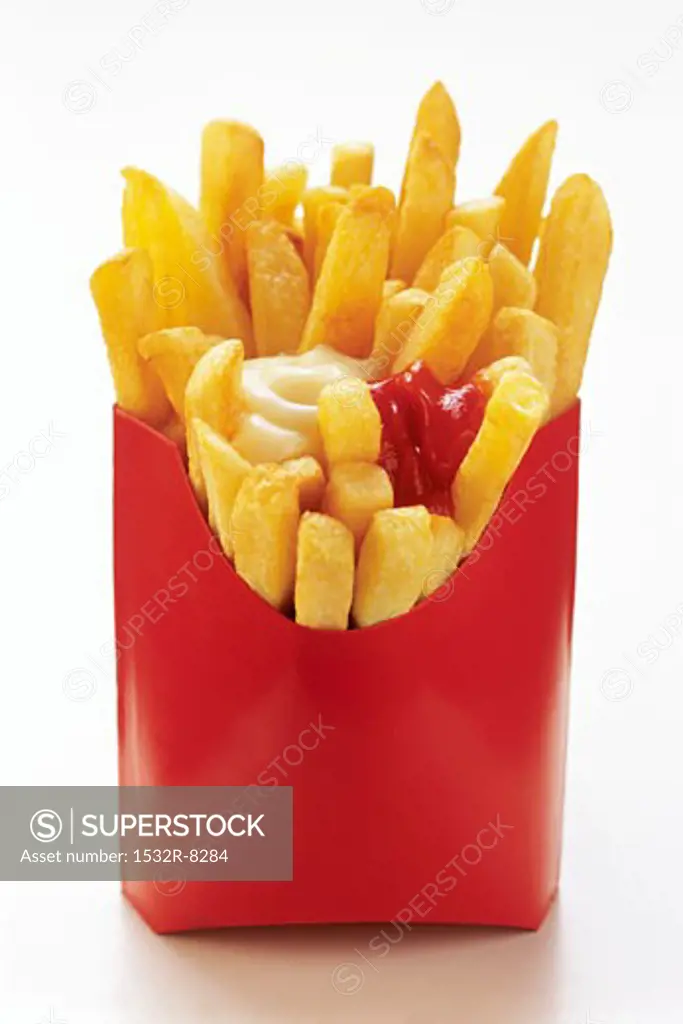 French Fries in Red Fast Food Box with Ketchup and Mayonnaise
