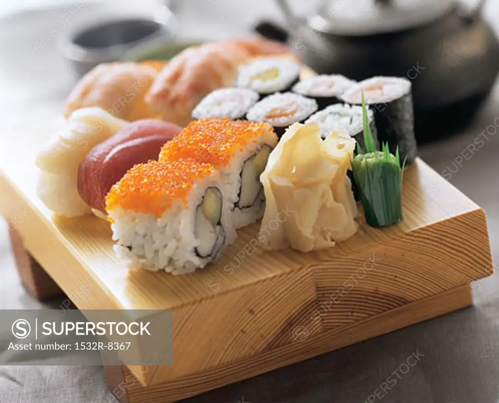 Assorted Sushi on Wooden Board