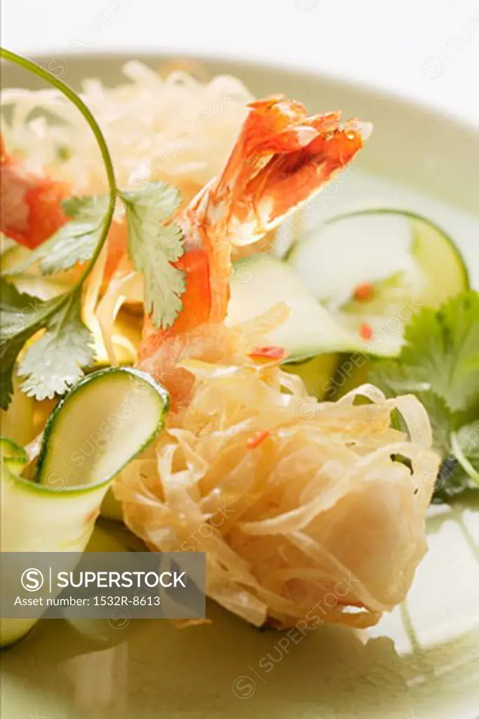 King prawns, fried in rice noodles, with courgette salad