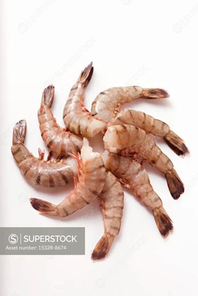 Several king prawns without heads