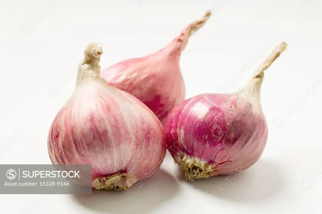 Three red onions
