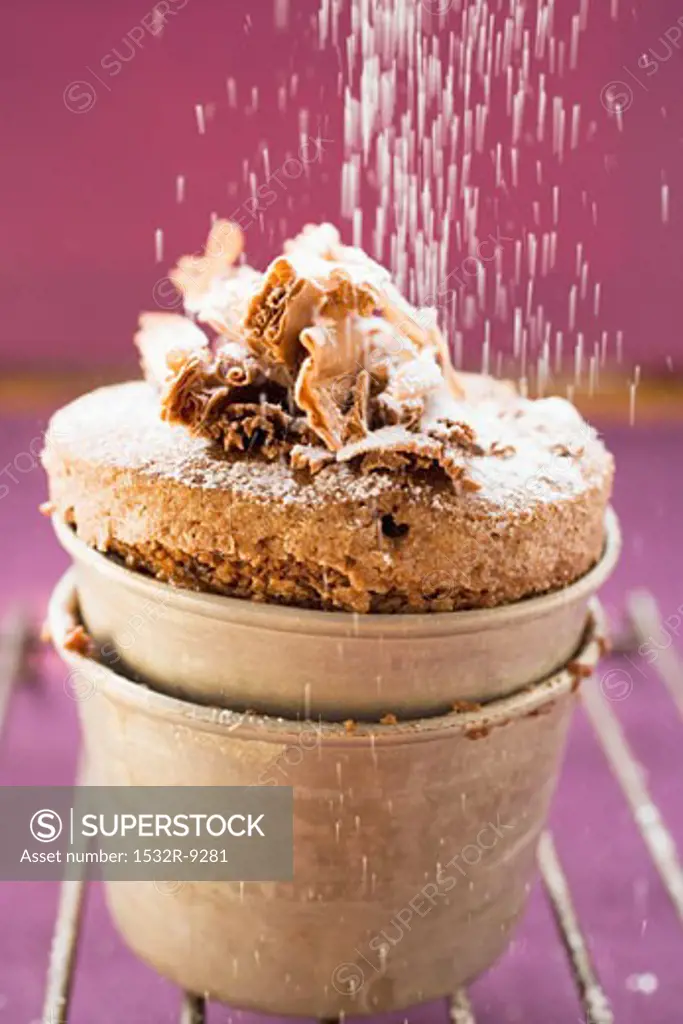 Sprinkling chocolate soufflT with icing sugar