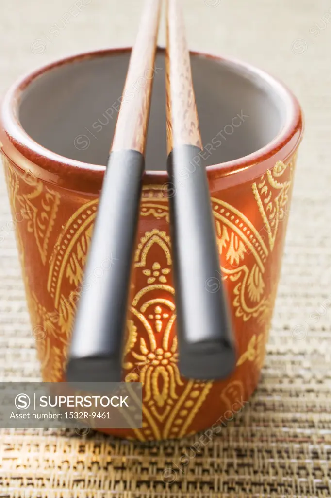 Asian beaker with chopsticks