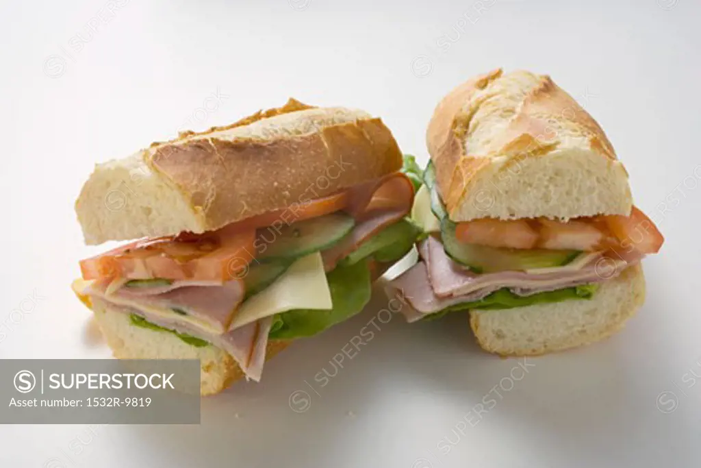 Baguette with ham, cheese, tomato, cucumber (halved)