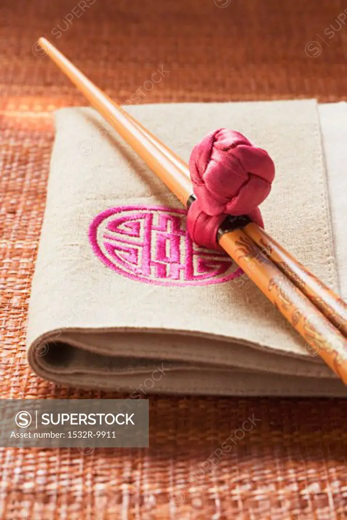 Chopsticks on fabric napkin (Asia)