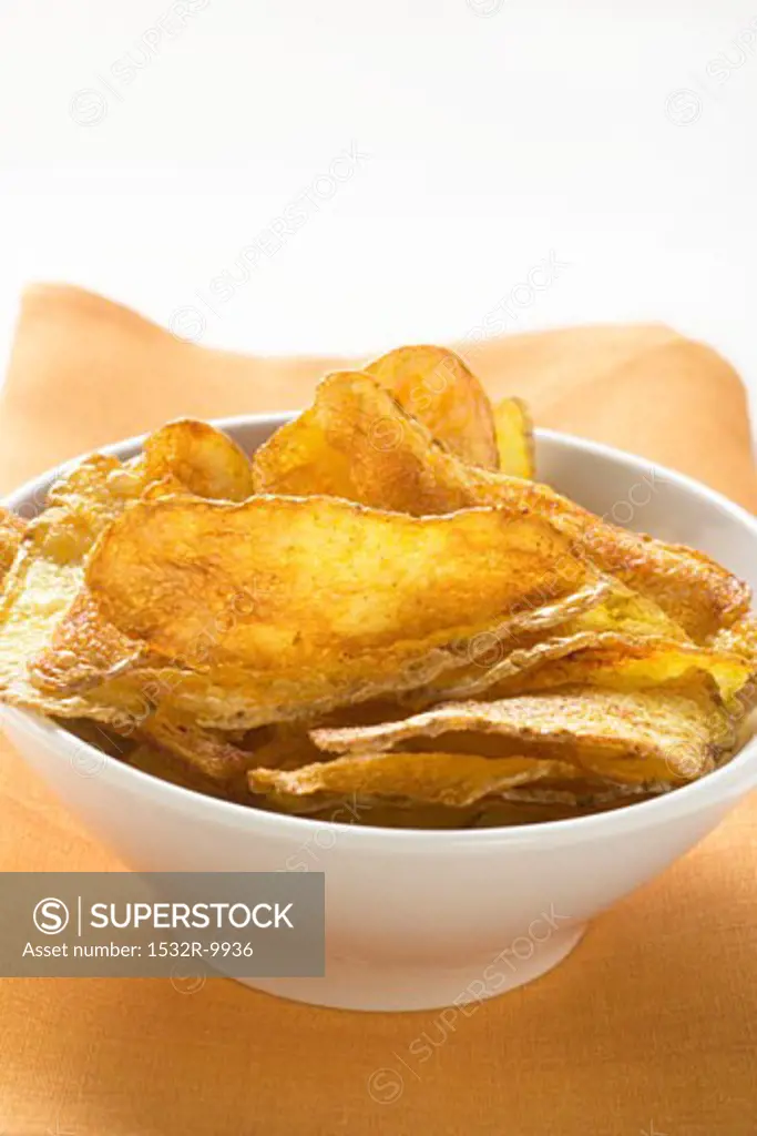 Potato crisps in bowl