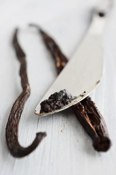 A vanilla pod and seeds which have been scraped out