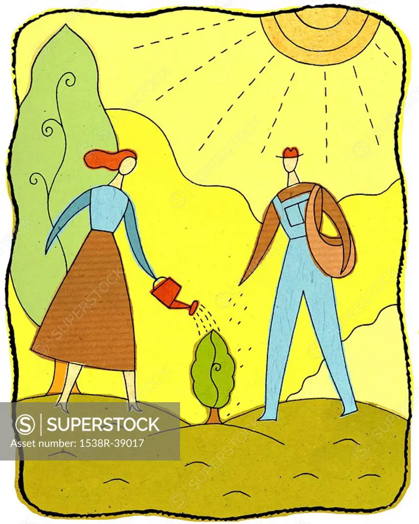 Man and woman watering a small tree