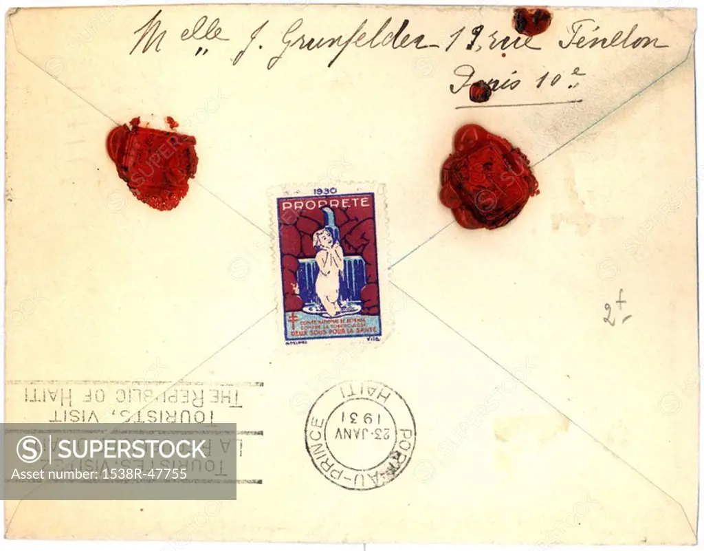 Vintage envelope with script writing and two red seals, Paris