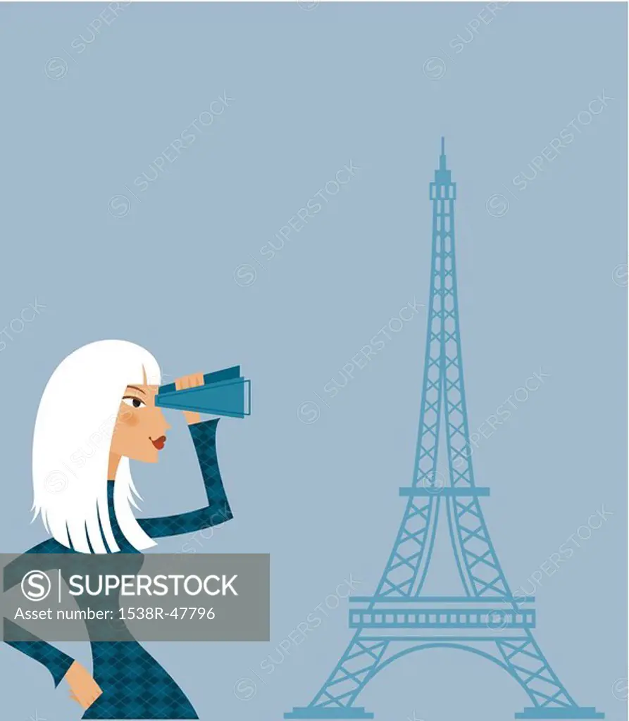 A woman looking at the Eiffel Tower with a pair of binoculars