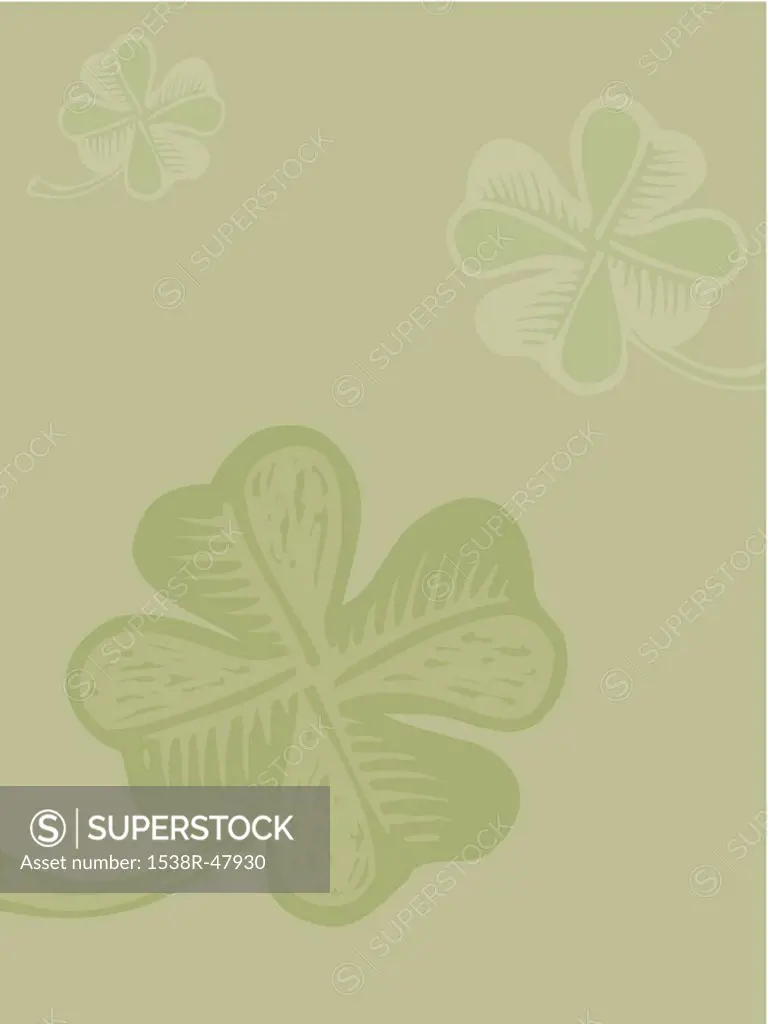 Four leaf clover on green background