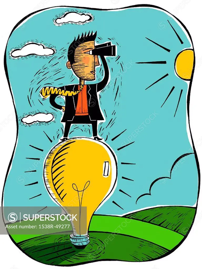 Businessman standing on a large lightbulb